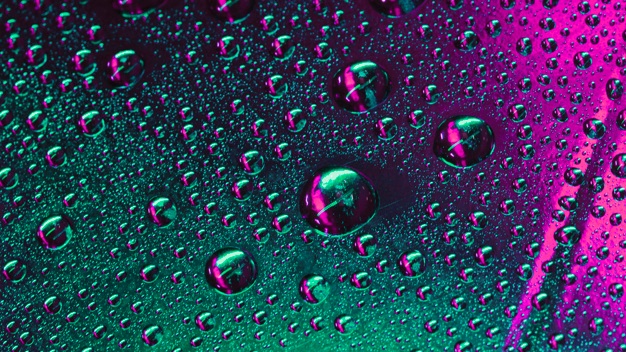 Obrazki - macro-di-gocce-di-acqua-verde-e-rosa-sulla-superficie_23-2148070968.jpg